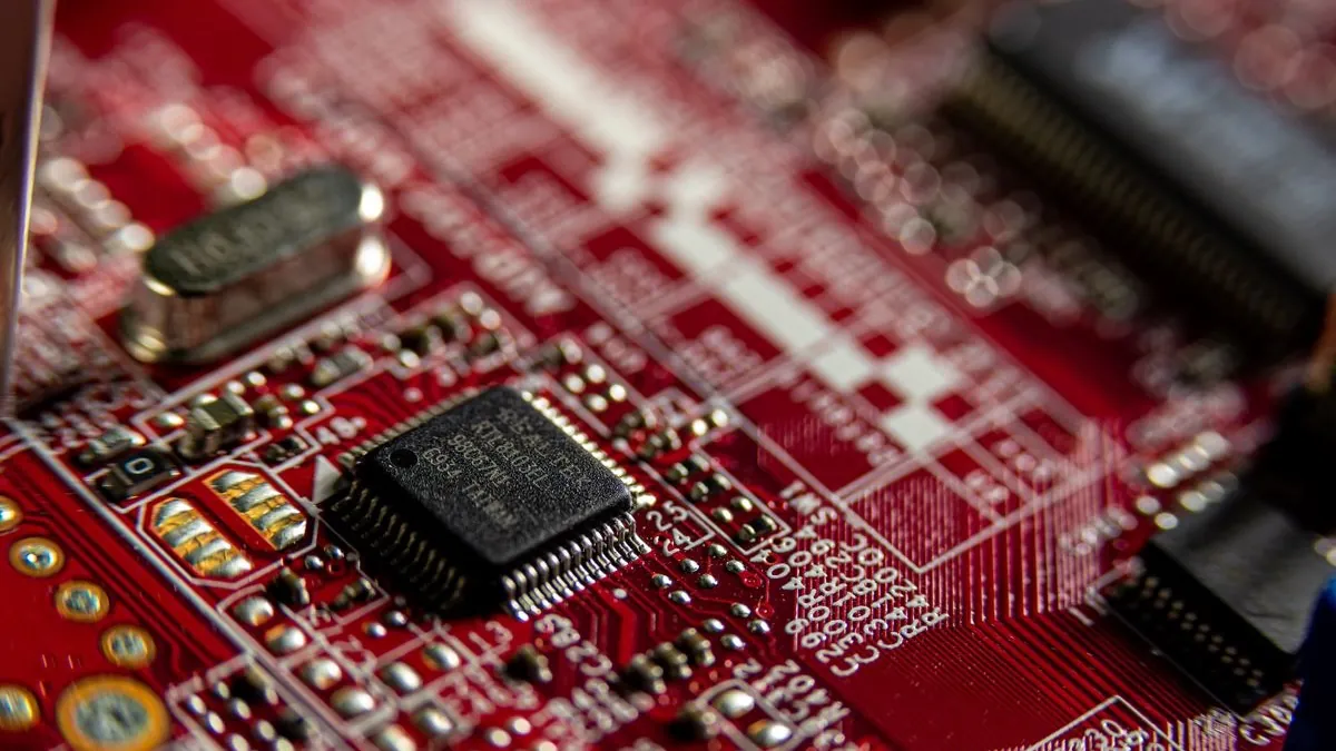 Close-up photograph of a processor and traces on a circuit board.