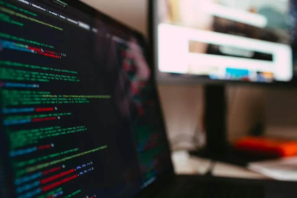 Laptop displaying a web application on a desk